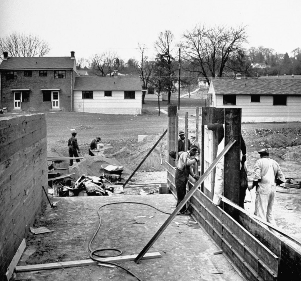 Workers building Cameron Valley in Alexandria circa early 1940s. Cameron was one of three wartime housing projects completed in Alexandria during World War II.