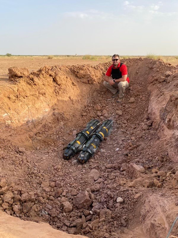 SrA Johnathon Hones working in the field