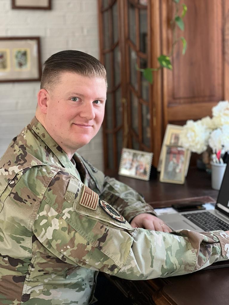 TSgt John Wetta - man in uniform at computer